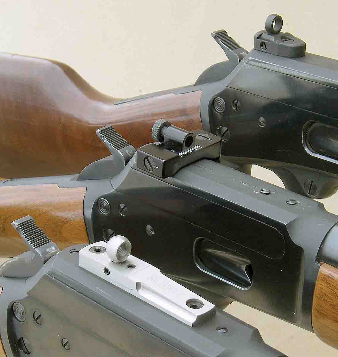 Aperture sights are excellent additions to a “hunting” levergun. Examples include (front to back): Skinner, Williams and X-S.